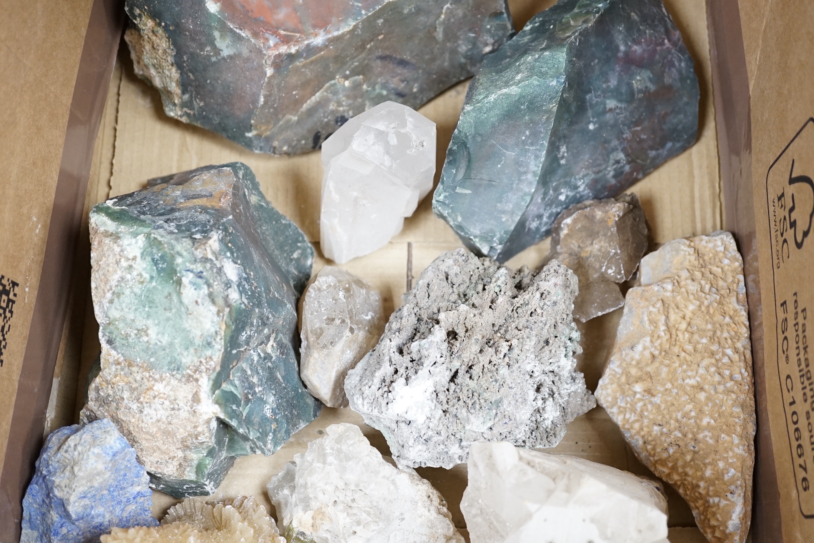 A quantity of quartz and various crystal specimens, the largest approximately 19cm wide